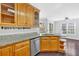 Well-equipped kitchen with granite countertops and stainless steel appliances at 46 Centerport Dr, White, GA 30184