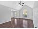 Sun-filled living room featuring hardwood floors and a large window at 46 Centerport Dr, White, GA 30184