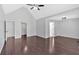 Spacious main bedroom with hardwood floors and ample closet space at 46 Centerport Dr, White, GA 30184