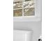 Close-up of toilet with bright white finish at 46 Centerport Dr, White, GA 30184