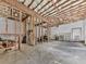 Unfinished basement with exposed beams, offering potential for customization and additional living space at 1166 Upper Sweetwater Se Trl, White, GA 30184