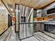 Modern kitchen with stainless steel appliances and wooden cabinets, perfect for culinary enthusiasts at 1166 Upper Sweetwater Se Trl, White, GA 30184
