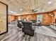 Spacious open concept living room with luxury vinyl plank flooring, wood ceiling and walls at 1166 Upper Sweetwater Se Trl, White, GA 30184