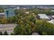 Aerial view showcasing the property's surrounding lush greenery and easy access to nearby parking at 1250 Parkwood Cir # 2312, Atlanta, GA 30339