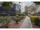 Condo community grounds with landscaping and a tennis court at 1250 Parkwood Cir # 2312, Atlanta, GA 30339