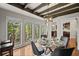 Bright dining area with large windows offering picturesque wooded views at 1670 Nordic Trce, Marietta, GA 30068
