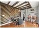 Chic dining area with wood accent wall and stylish modern furniture at 1670 Nordic Trce, Marietta, GA 30068