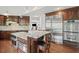 Spacious kitchen featuring stainless steel appliances, granite counters, and a center island at 1670 Nordic Trce, Marietta, GA 30068