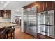 Gourmet kitchen with stainless steel appliances and granite countertops at 1670 Nordic Trce, Marietta, GA 30068
