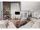 Bright living room featuring a stone fireplace and comfortable seating at 1670 Nordic Trce, Marietta, GA 30068