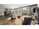 Open living room showcasing a stone fireplace, vaulted ceiling, and seamless flow to the dining area at 1670 Nordic Trce, Marietta, GA 30068