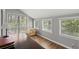 Bright office space with natural light from multiple windows and hardwood floors at 1670 Nordic Trce, Marietta, GA 30068