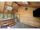 Vaulted ceiling and natural light highlight this indoor sunroom with hot tub at 1670 Nordic Trce, Marietta, GA 30068
