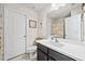 Well-lit bathroom features a modern vanity, framed art, and a shower with playful seahorse curtains at 127 Crest Brooke Dr, Canton, GA 30115
