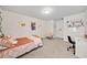 Bright bedroom featuring plush bedding, personal decorations, and an inviting atmosphere at 127 Crest Brooke Dr, Canton, GA 30115