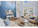 Bright living room with high ceilings, lots of natural light, and stylish furniture at 127 Crest Brooke Dr, Canton, GA 30115
