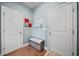 Functional mudroom with storage bench and hooks for organizing coats and shoes by the door at 127 Crest Brooke Dr, Canton, GA 30115
