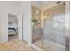 Modern bathroom with a large glass-enclosed shower and updated fixtures at 127 Crest Brooke Dr, Canton, GA 30115