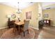 Inviting dining space with a wooden table, comfortable chairs, and stylish decor at 1478 Settlers Walk Sw Way, Marietta, GA 30060