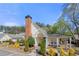 Charming exterior view of the property showcasing manicured landscaping and inviting entrance at 1478 Settlers Walk Sw Way, Marietta, GA 30060