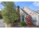 Charming home featuring a well-maintained lawn with mature trees and an inviting facade at 1478 Settlers Walk Sw Way, Marietta, GA 30060
