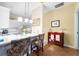Bright kitchen featuring a breakfast bar with pendant lighting and stylish floral stools at 1478 Settlers Walk Sw Way, Marietta, GA 30060