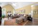 Spacious living area with a vaulted ceiling, a fireplace, a comfortable sectional, and a cozy atmosphere at 1478 Settlers Walk Sw Way, Marietta, GA 30060