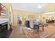 Open living space featuring a fireplace, a large comfortable sofa, and a dining area at 1478 Settlers Walk Sw Way, Marietta, GA 30060