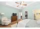 Main bedroom with tray ceilings and neutral color palette with an ensuite bathroom and walk-in closet at 1478 Settlers Walk Sw Way, Marietta, GA 30060