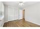 Bedroom with hardwood floors, natural light, and closet at 2407 Ridgeway Dr, Doraville, GA 30360