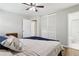 Bedroom showcases hardwood floors, closet, and adjoining bathroom with tiled shower at 2407 Ridgeway Dr, Doraville, GA 30360
