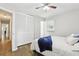Bedroom showcases hardwood floors, closet, and view to hall at 2407 Ridgeway Dr, Doraville, GA 30360