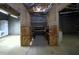 Unfinished basement space with carpeting, exposed plumbing and a fire extinguisher at 250 Blackberry Ln, Douglasville, GA 30134