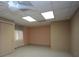 Unfinished basement space with carpet, drop ceiling, and potential for customization at 250 Blackberry Ln, Douglasville, GA 30134