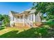 Charming home exterior with well-manicured lawn and inviting front porch at 250 Blackberry Ln, Douglasville, GA 30134