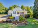Charming two-story home with a well-manicured front yard and inviting porch at 250 Blackberry Ln, Douglasville, GA 30134