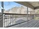 Spacious balcony with wood flooring and a metal railing offers a great view of the surroundings at 2901 Lenox Ne Rd # 901, Atlanta, GA 30324
