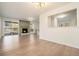 Open floor plan with hardwood floors, fireplace, and natural light at 2901 Lenox Ne Rd # 901, Atlanta, GA 30324