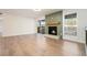 Spacious living room with hardwood floors, fireplace and natural light at 2901 Lenox Ne Rd # 901, Atlanta, GA 30324