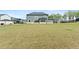 Expansive backyard with lush green lawn, offering ample space for outdoor activities and recreation at 133 Bastian Rd, Mcdonough, GA 30252