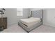 Comfortable bedroom with a tufted headboard, soft carpet, and natural light from a window at 133 Bastian Rd, Mcdonough, GA 30252