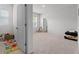 Spacious bonus room that features a play area and seating at 133 Bastian Rd, Mcdonough, GA 30252
