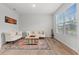 Inviting living room with natural light, showcasing neutral tones and stylish decor at 133 Bastian Rd, Mcdonough, GA 30252