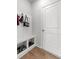 Mud room featuring a convenient bench, storage cubbies, and hooks for organization near the front door at 133 Bastian Rd, Mcdonough, GA 30252