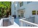 Back deck with white railings, grill, and stairs leading to yard at 2296 Valley Brook Ne Way, Atlanta, GA 30319