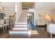Bright foyer with hardwood floors, staircase, and view of the living room at 2296 Valley Brook Ne Way, Atlanta, GA 30319