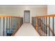 Upper hallway features decorative wrought iron handrails at 2296 Valley Brook Ne Way, Atlanta, GA 30319