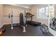 A home gym with weightlifting equipment and a treadmill at 2296 Valley Brook Ne Way, Atlanta, GA 30319