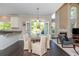 Open kitchen and dining area with a fireplace and access to the outdoor deck at 2296 Valley Brook Ne Way, Atlanta, GA 30319