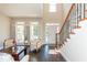 Inviting living room with lots of natural light, staircase and dark hardwood floors at 2296 Valley Brook Ne Way, Atlanta, GA 30319
